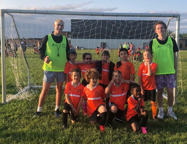 Soccer youth team at goal