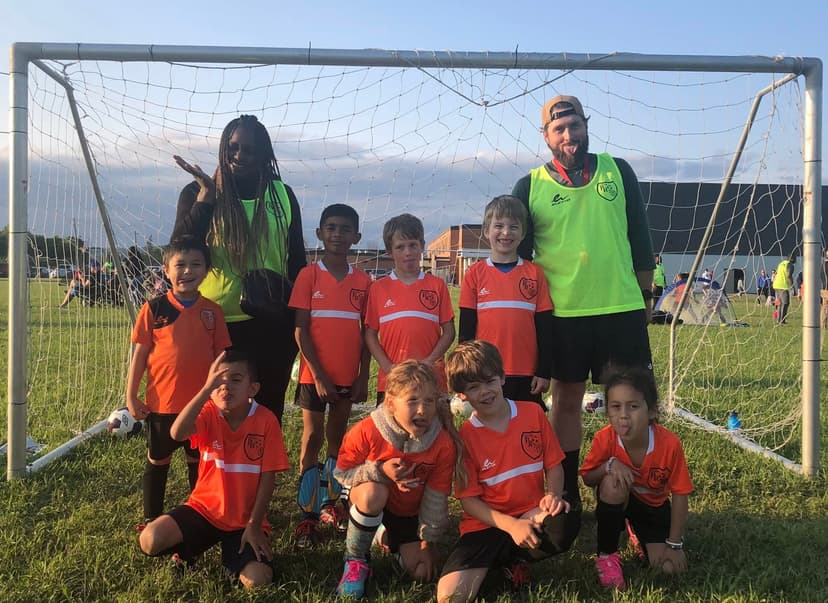 Soccer kids team at goal