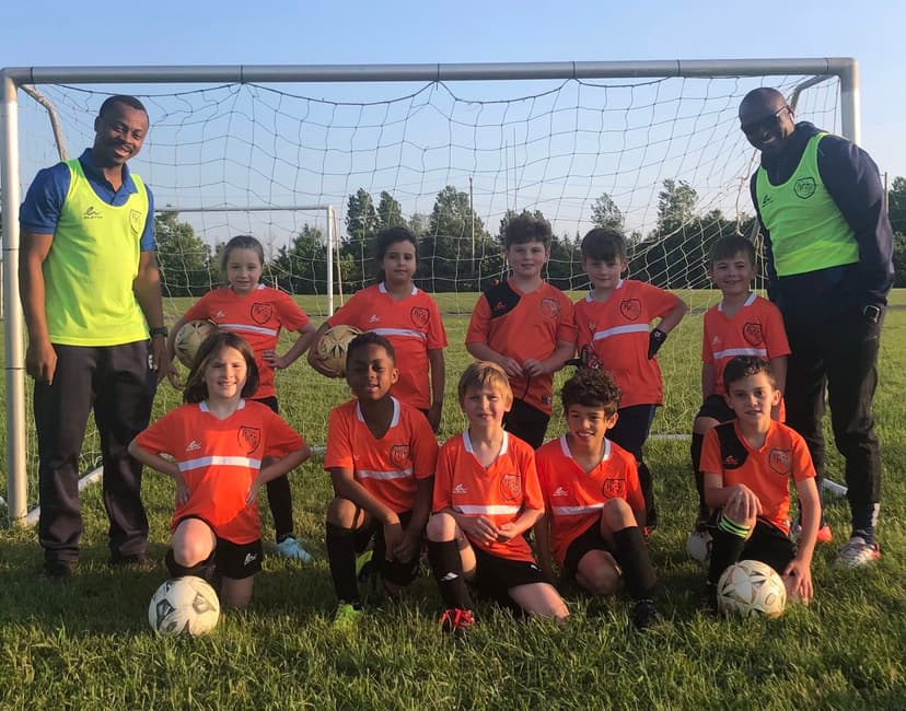 Soccer boys team at goal